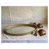 Mirror with gold shelf