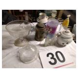 Old bottles, talc can, glass funnel, and misc