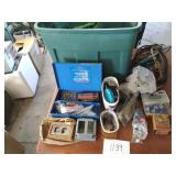 Tote full of electrical items and extension cords