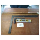 Squarw yard sticks, level and squares