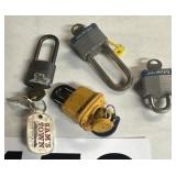 Four padlocks with keys