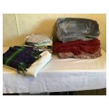 Assortment of blankets and sheets