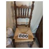 Wooden chair w/ rattan seat