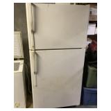 GE Refrigerator- working. (Content not included)