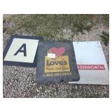 Two mudflaps, metal sign