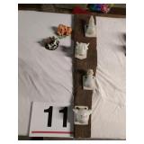 Porcelain animal hangers and resin cow and pigs