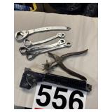 Wrenches, stapler, leather punch
