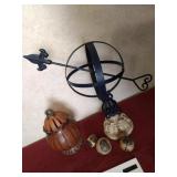 Metal armillary sphere sundial, resin jar and