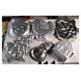 Cake molds mostly Wilton
