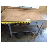 Metal work bench with electric hookup and small