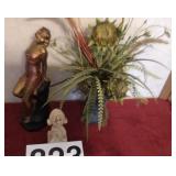 Woman figurine, faux plant and lawyer figurine