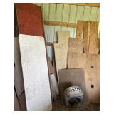 Miscellaneous lumber and corner shovel,