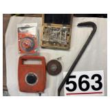 Router base, tape, measures, crowbar, etc.