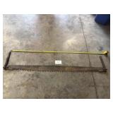 Vintage cross cut saw 6 foot laid