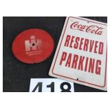 IH saw blade and Coca Cola parking sign