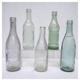 5 Embossed Straight Side Glass Bottles