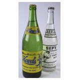 2 Filled Glass Bottles: Howel