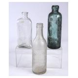 3 Vintage Embossed Glass Bottles