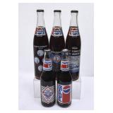 5 Pepsi Commemorative Filled Clear Glass Bottles