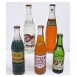 5 Filled Glass Soda Bottles