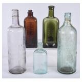 5 Embossed Glass Medicine Bottles
