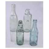 4 Blue-Green Embossed Glass Bottles