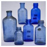 6 Various Size Blue Glass Milk of Magnesia Bottles
