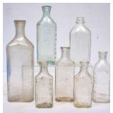 7 Graduated Clear Glass Medicine Bottles