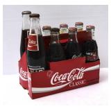 8 Coca-Cola Filled Glass Soda Bottles