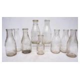 9 Embossed NY Milk Bottles