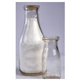 2 Monroe, NC Embossed Round Milk Bottles