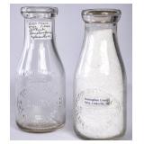 2 NC Embossed Round Pint Milk Bottles