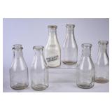 6 NC Embossed Round Clear Quart Milk Bottles