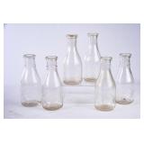 6 NC Embossed Round Clear Quart Milk Bottles