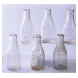 6 NC Embossed Clear Round Quart Milk Bottles