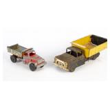 Vintage Marx and Hubley Dump Trucks.