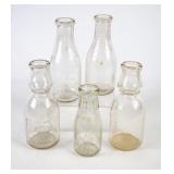 5 Embossed Round Milk Bottles