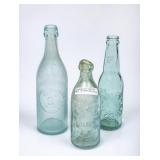 3 SC Green Glass Straight Side Embossed Bottles
