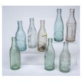 8 Mid-West Straight Side Embossed Bottles