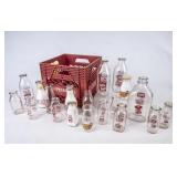 19 PET Milk Bottles in Red Crate