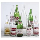 9 Large Soda Bottles in Milk Crate