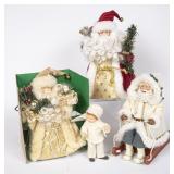 3 Santa Figurines & Boy