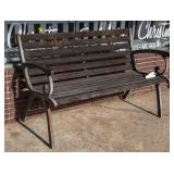 Park style bench with wooden slats and cast ends.