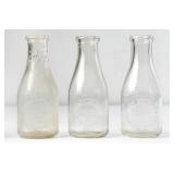 3 NC Embossed Round Clear Quart Milk Bottles