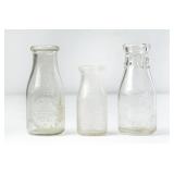 3 Asheville, NC Embossed Round Clear Milk Bottles