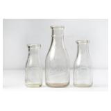 3 NC Embossed Round Clear Glass Milk Bottles
