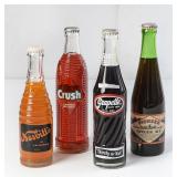 4 Filled Soda Bottles