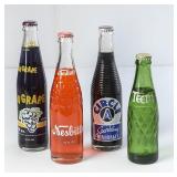 4 Soda Filled Bottles