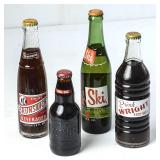 Lot of 4 Soda Filled Bottles