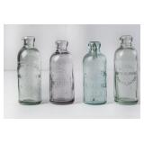 Lot of 4 Embossed Hutchinson Bottles